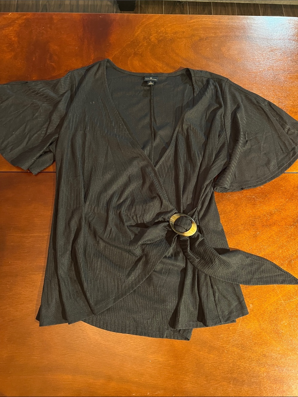 Worthington Black Wrap Top with Decorative Buckle and slit flowy sleeves